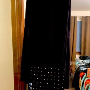 Woman’s Lane Bryant Leggings with gold colored beads on the bottom of legs